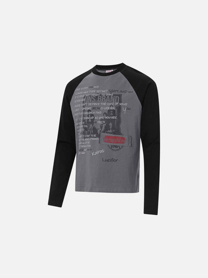 Detail of the neckline and graphic print on the raglan T-shirt