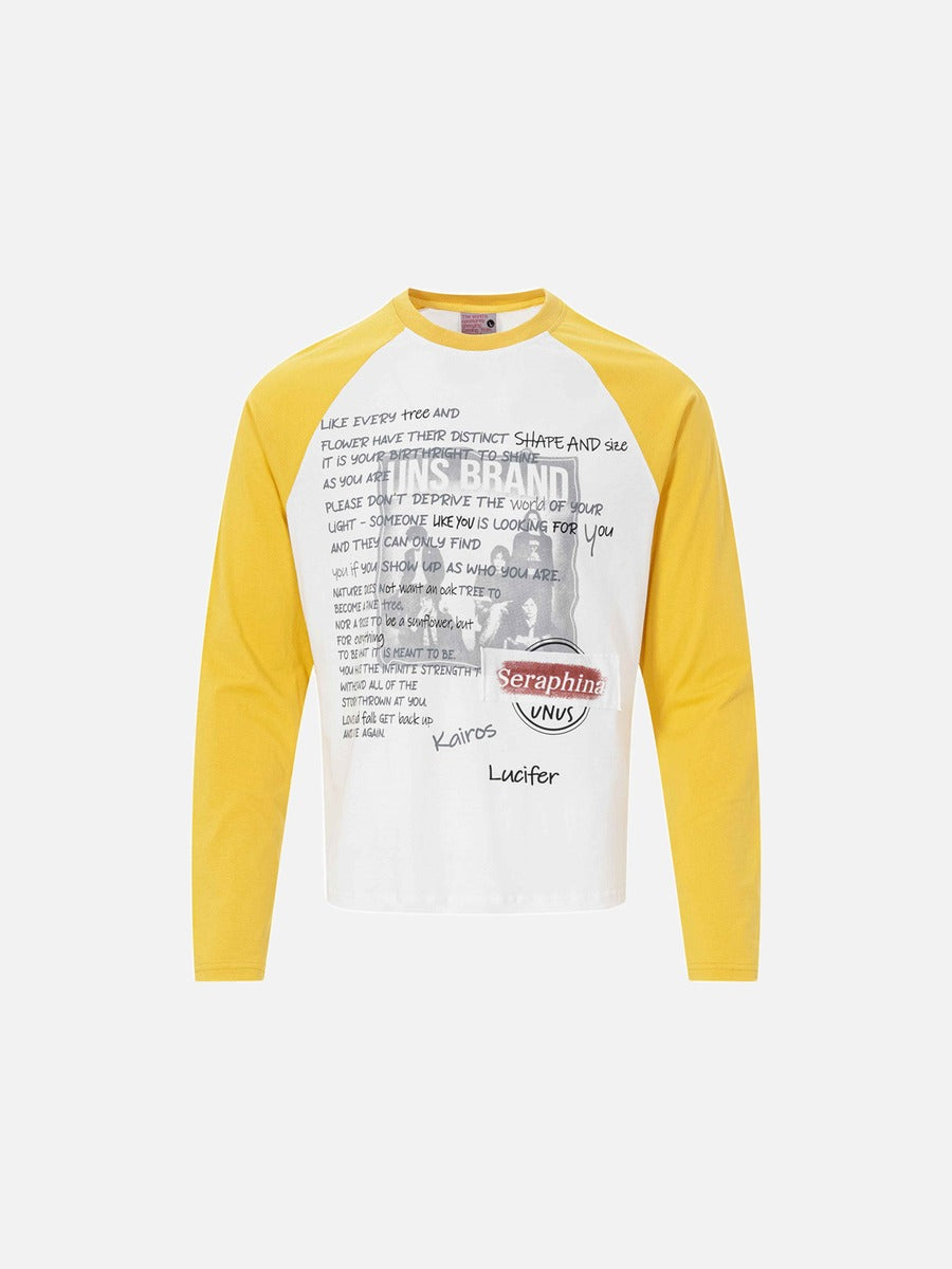 Front view of a white and yellow graphic raglan T-shirt