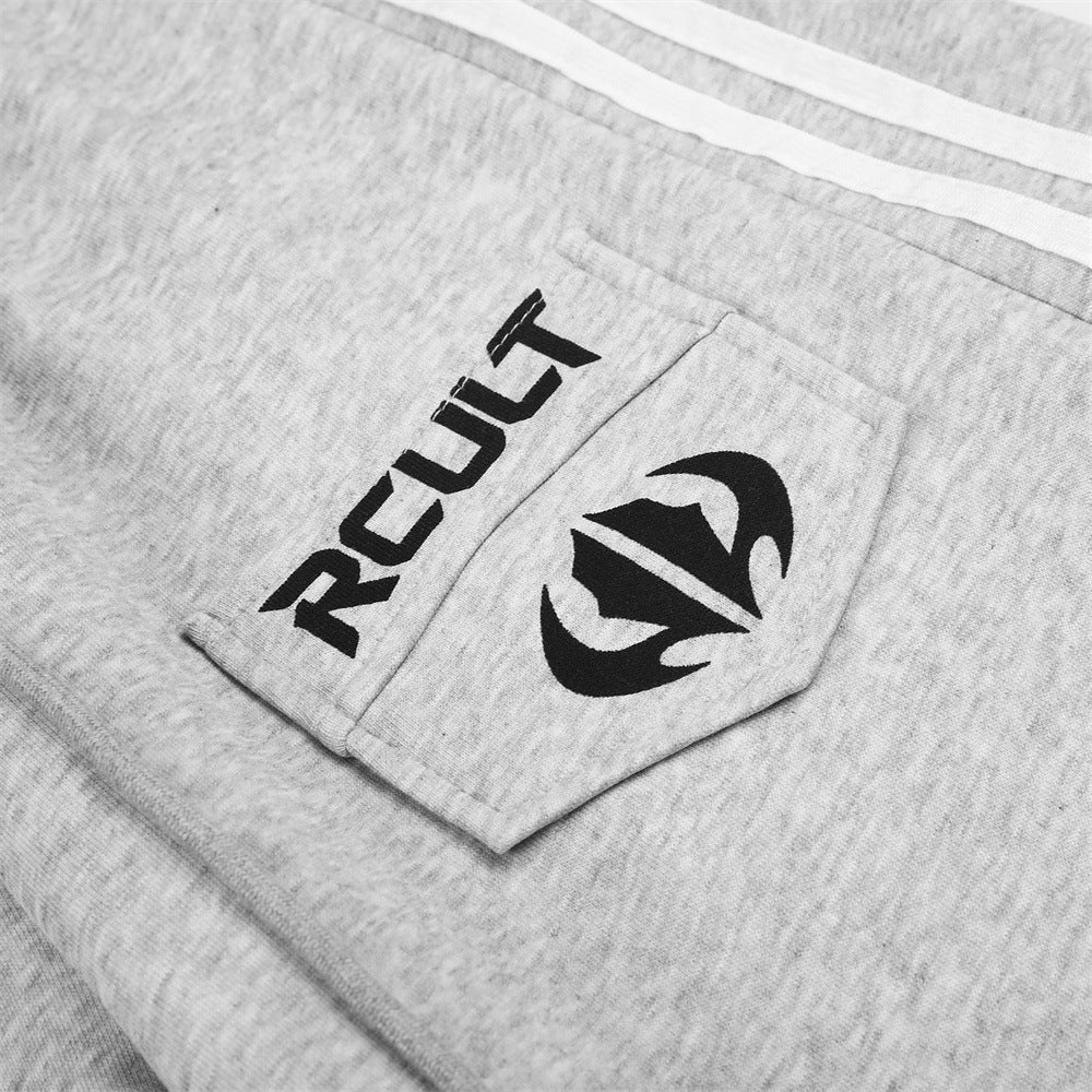 Back view of black and grey sweatpants with the winged design