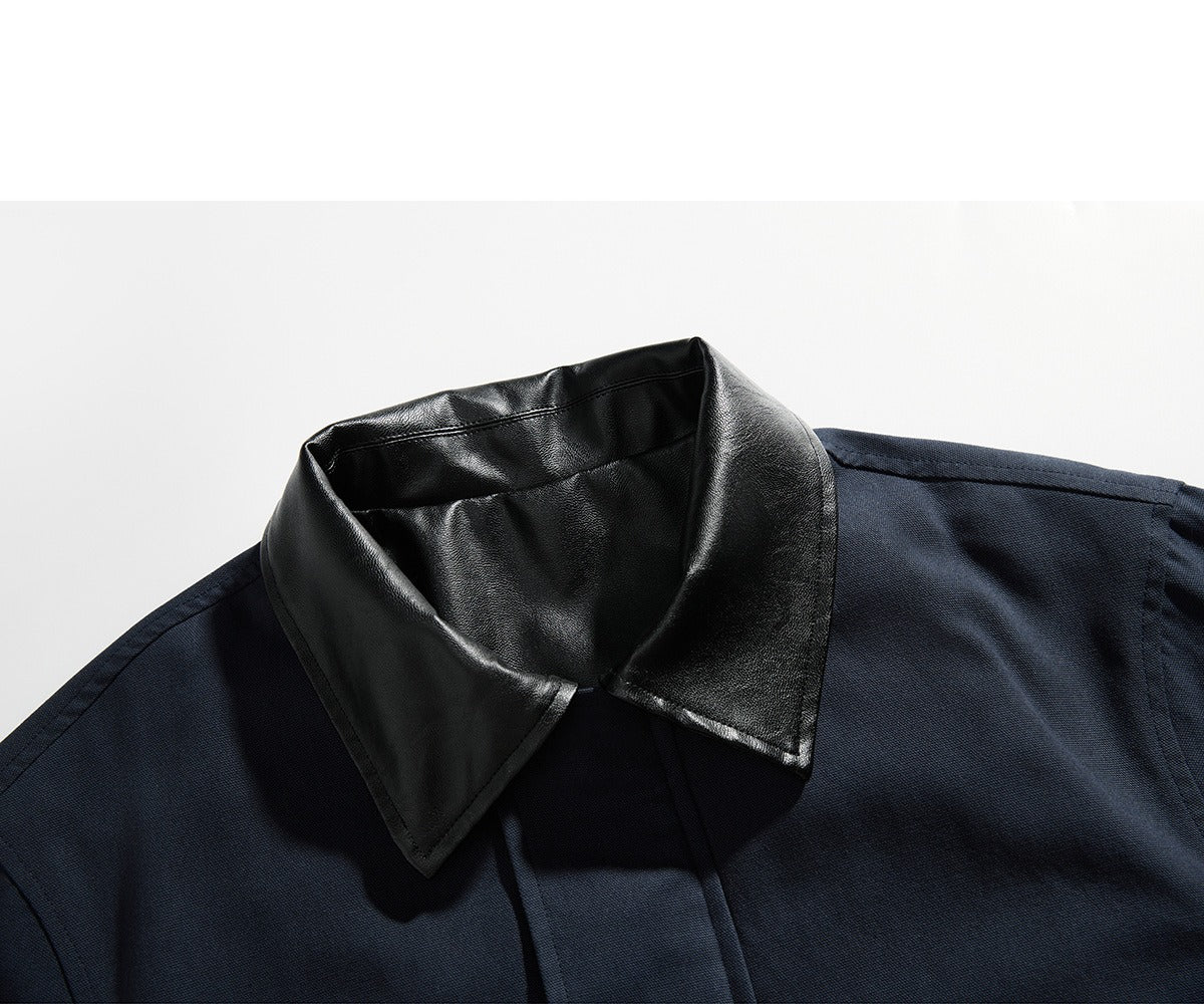 Close-up of the contrast collar on a casual navy jacket