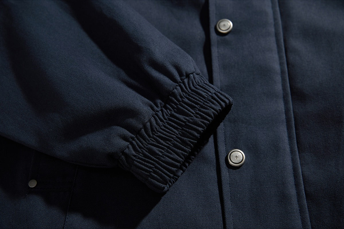 Close-up of the contrast collar on a casual khaki jacket