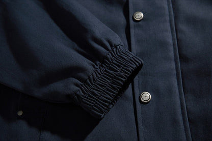 Close-up of the contrast collar on a casual khaki jacket