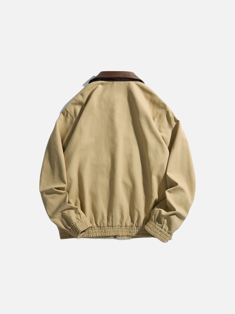 Side view of a khaki jacket with a contrast collar