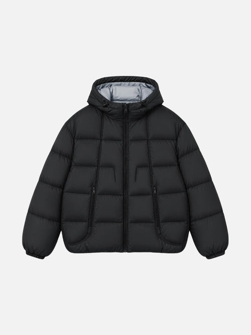 Oversized contrast hooded puffer jacket shown from the front
