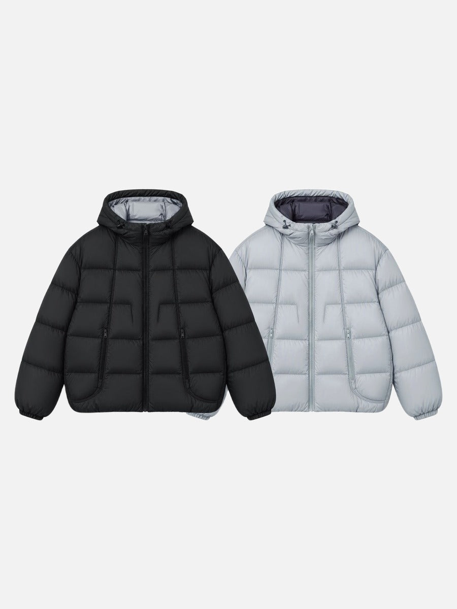 Oversized hooded puffer jacket styled for everyday cold-weather wear