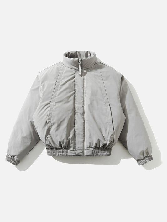 Cropped light grey padded bomber jacket displayed from the front