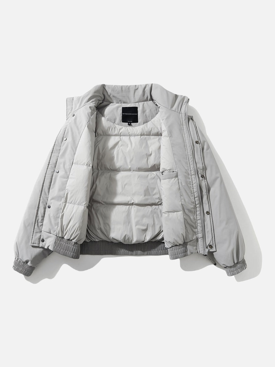 Full view of the cropped light grey padded bomber jacket