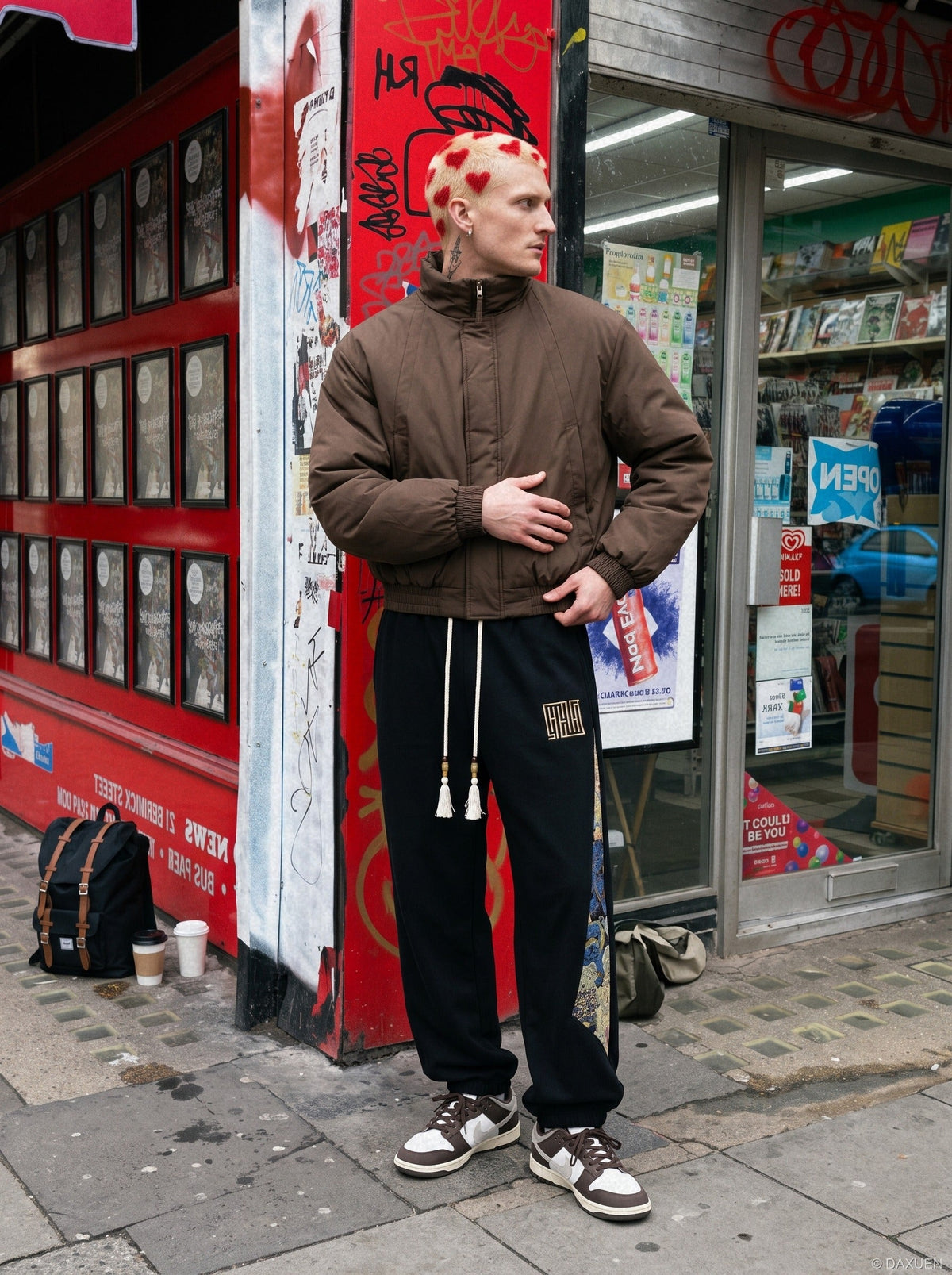 Cropped light grey bomber jacket showing its padded texture