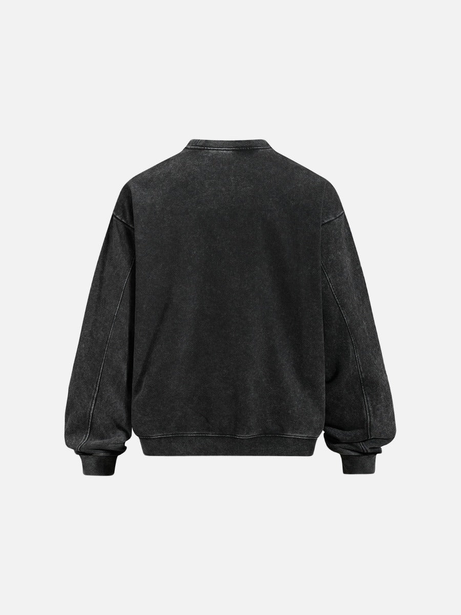 Back view of the oversized charcoal graphic sweatshirt