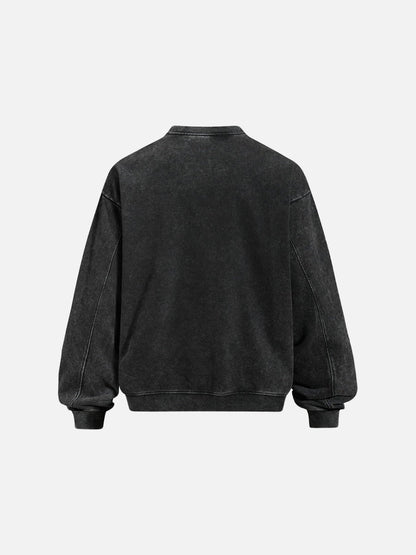 Back view of the oversized charcoal graphic sweatshirt