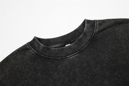 Side view showing the relaxed oversized fit of the sweatshirt