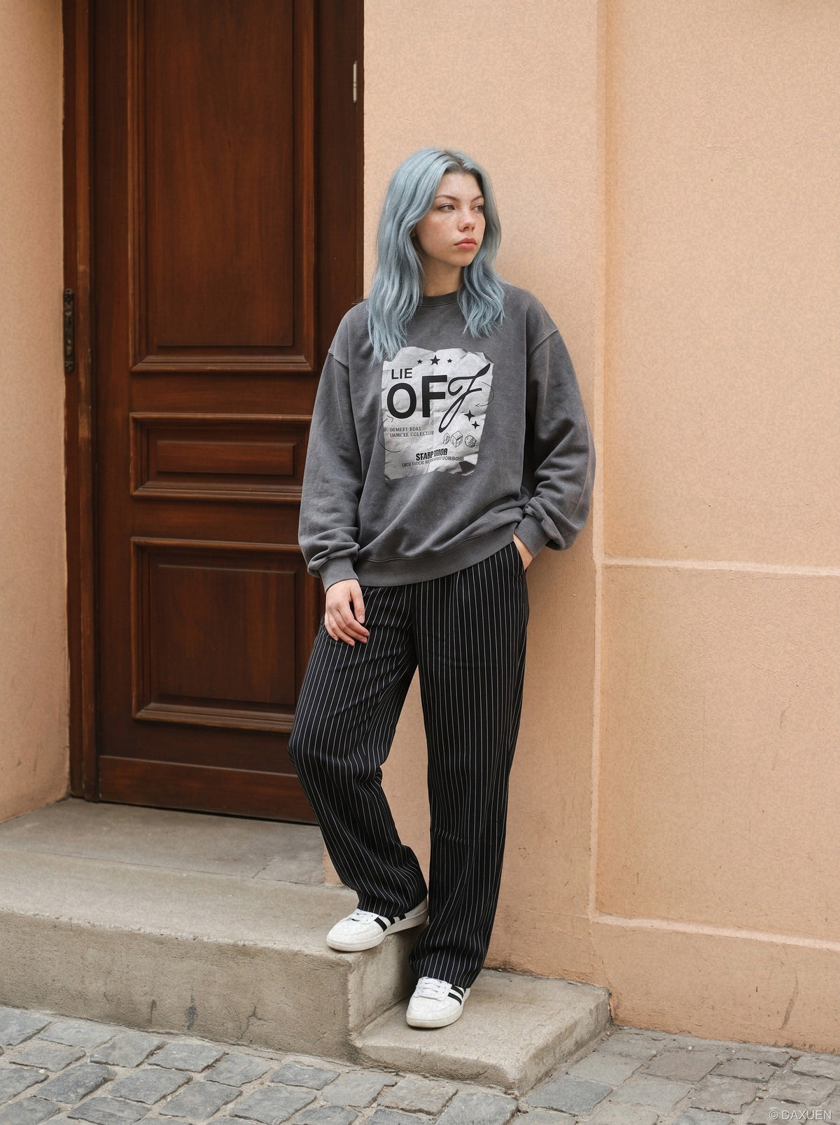 Soft charcoal sweatshirt with a statement graphic on the front
