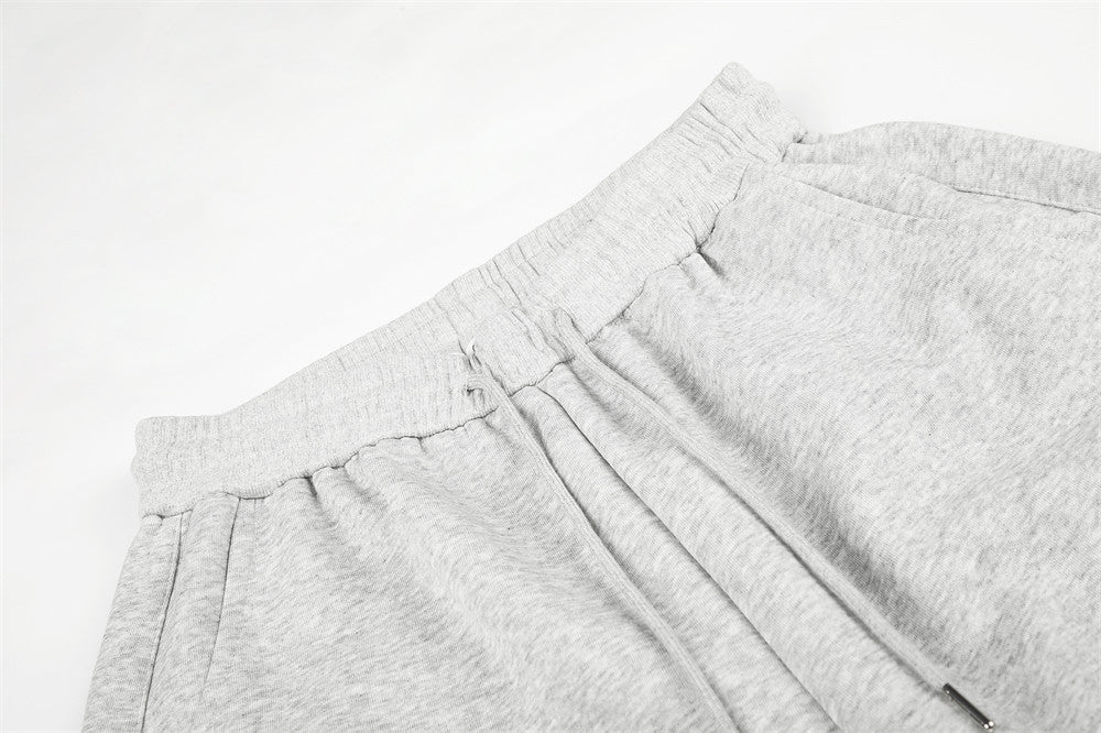 Waist detail of striped wide-leg shorts showing fit and construction