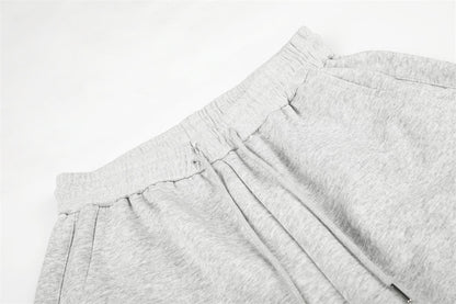 Waist detail of striped wide-leg shorts showing fit and construction