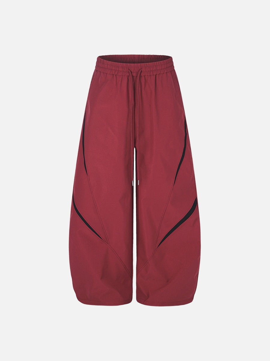 Front view of the red and black star graphic tracksuit