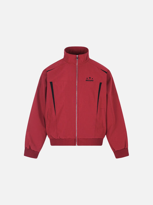 Red and black star graphic tracksuit shown as a coordinated two-piece outfit