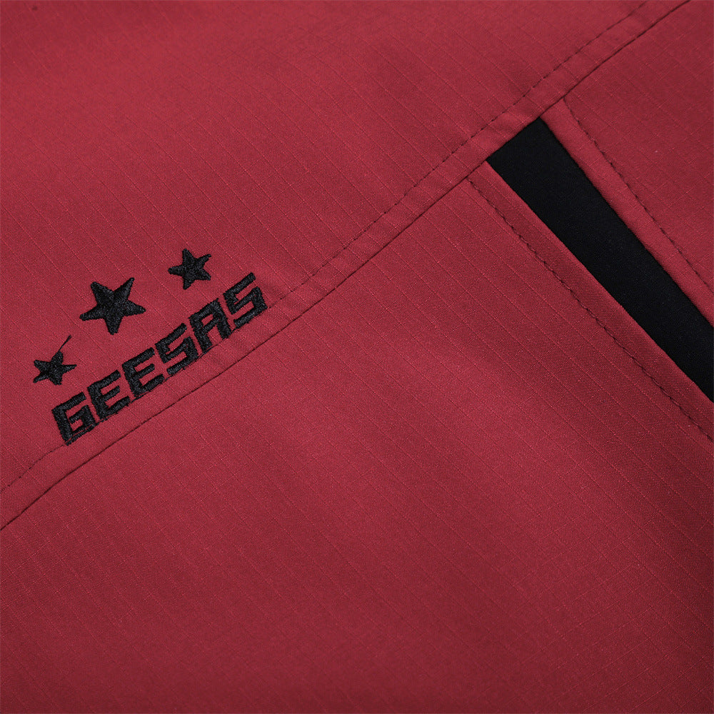 Red and black tracksuit styled as a casual everyday outfit