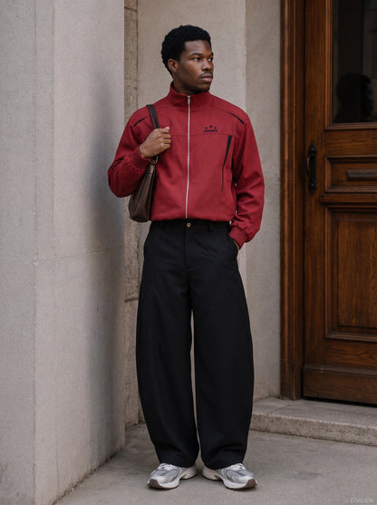 Side view showing the red and black tracksuit silhouette