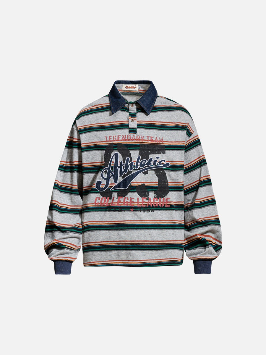 Front view of an oversized striped graphic polo shirt with distressed 65 print