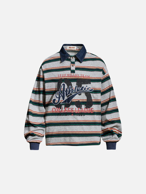 Front view of an oversized striped graphic polo shirt with distressed 65 print