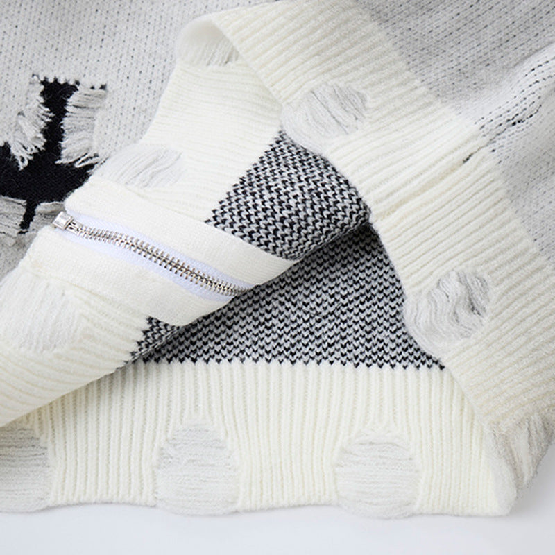 Distressed knit jumper displayed for everyday layering