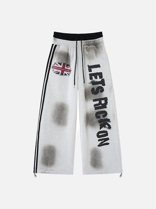 Distressed flag graphic wide-leg sweatpants shown from the front