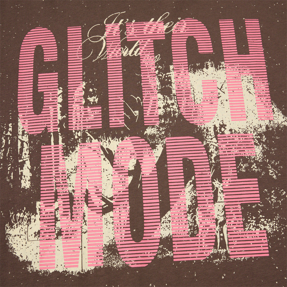 Fabric texture of distressed pink graphic T-shirt with layered look