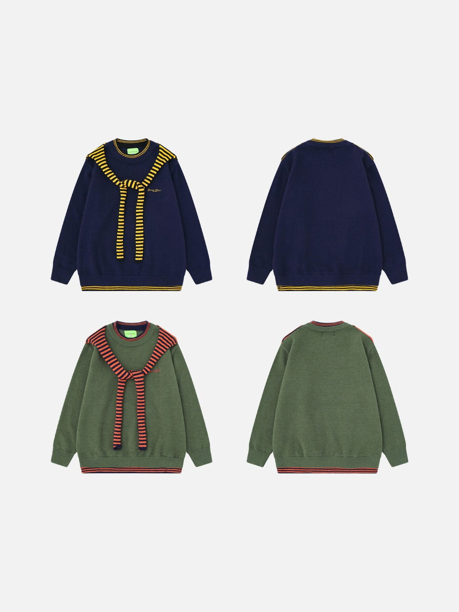 Soft knit fabric detail on an olive and navy striped sweater