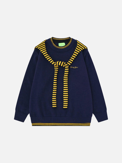 Draped knit sweater in olive and navy shown from the back