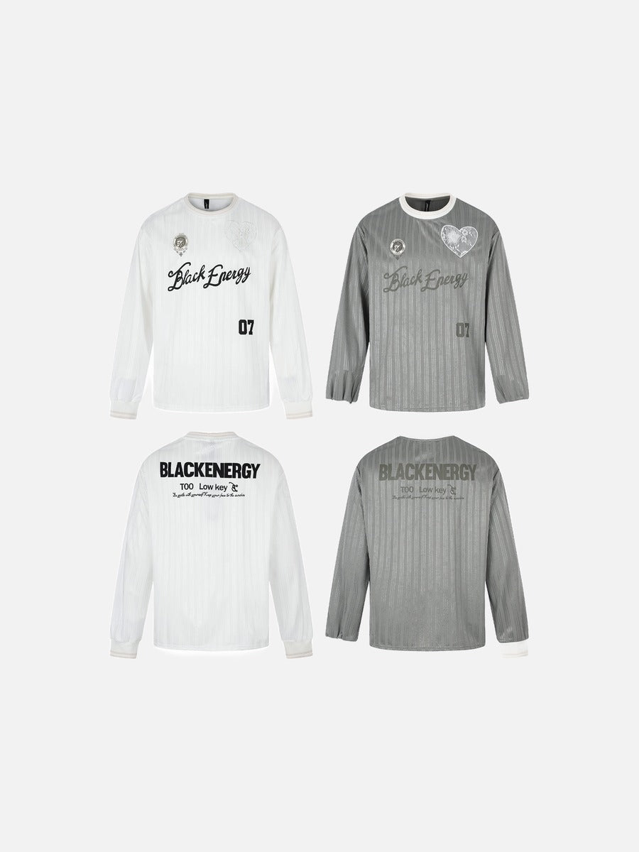 Folded oversized jersey T-shirt showing embroidered crest