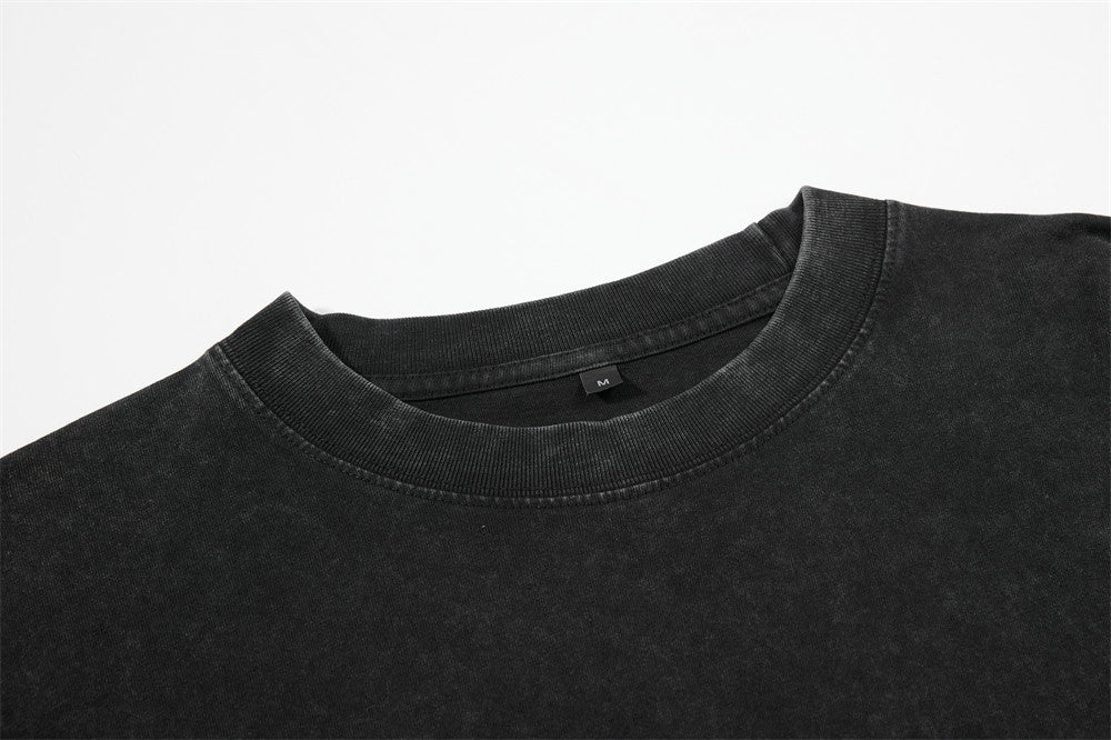 Side view of the faded grey layered graphic long-sleeve T-shirt