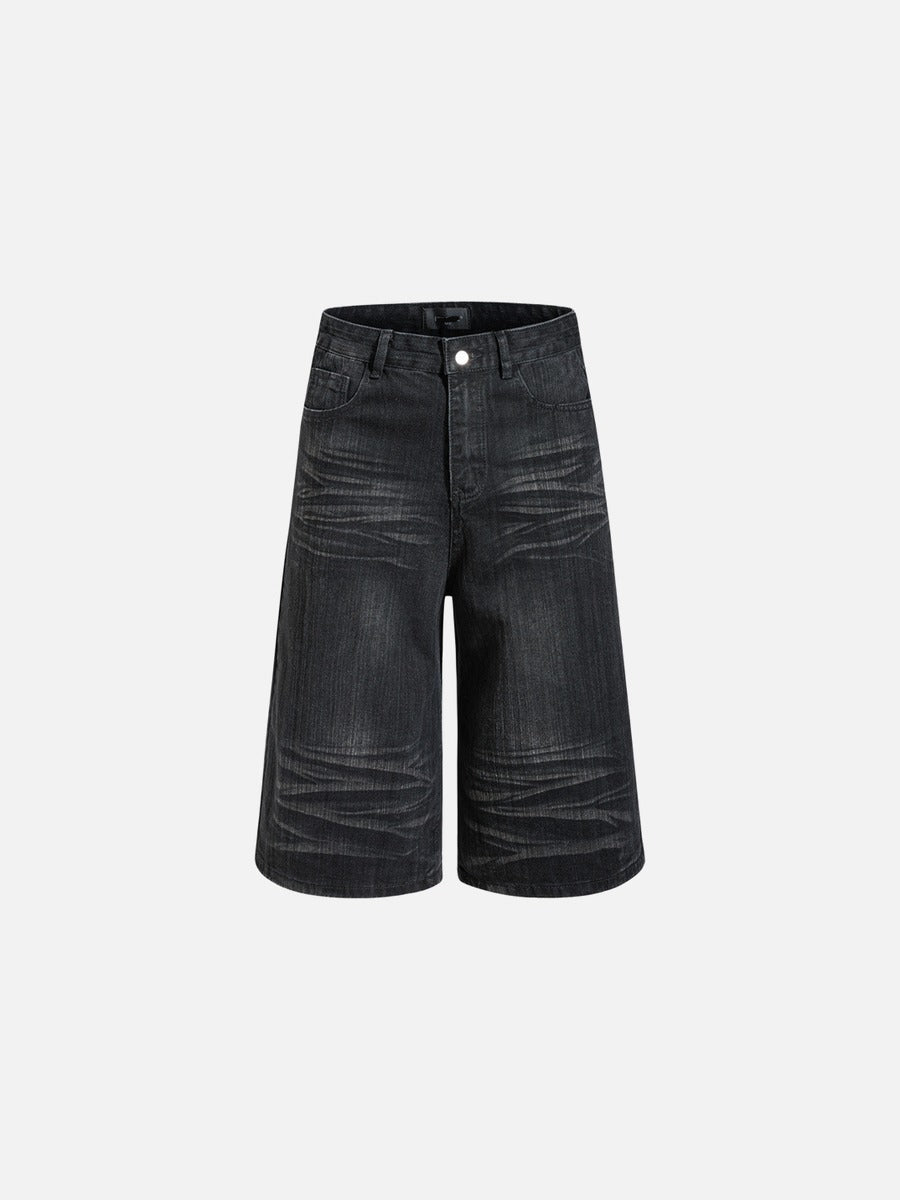 Front view of wide-leg denim shorts in faded black
