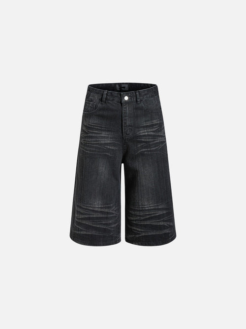 Front view of wide-leg denim shorts in faded black