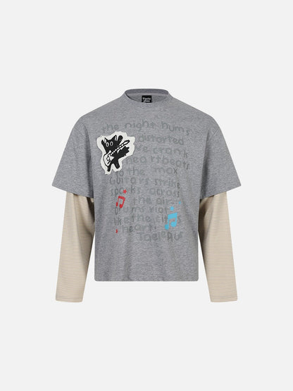 Oversized graphic T-shirt featuring a cartoon cat design