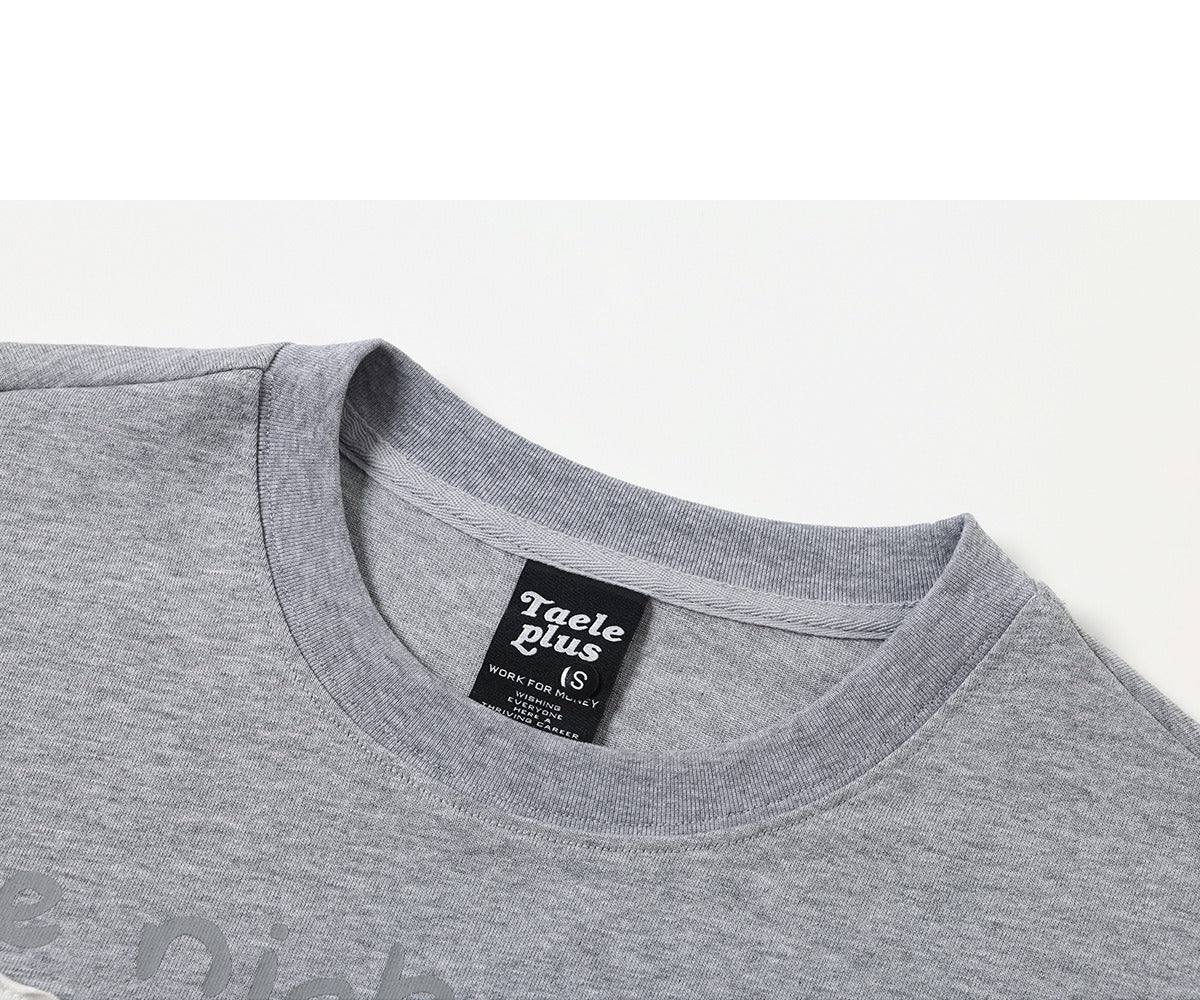 Graphic cat T-shirt styled for a casual everyday outfit