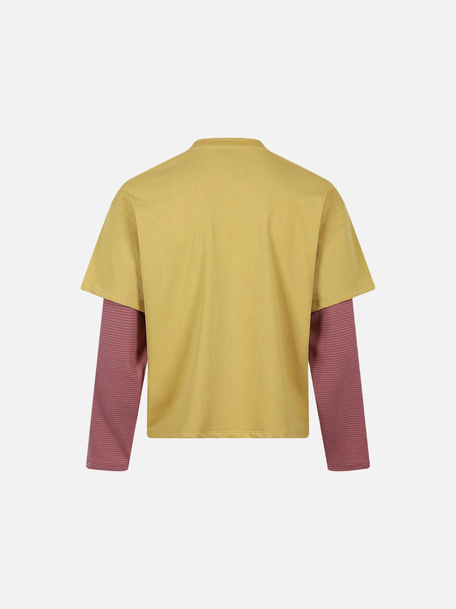 Detailed view of the cat artwork on the front of the T-shirt