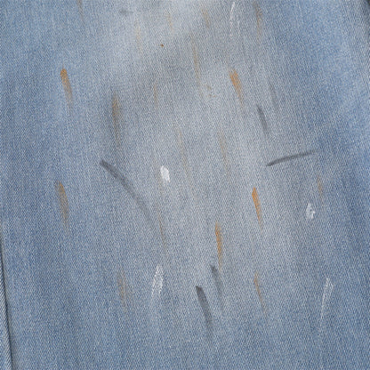 Close-up of waistband and front fastening on denim culotte shorts
