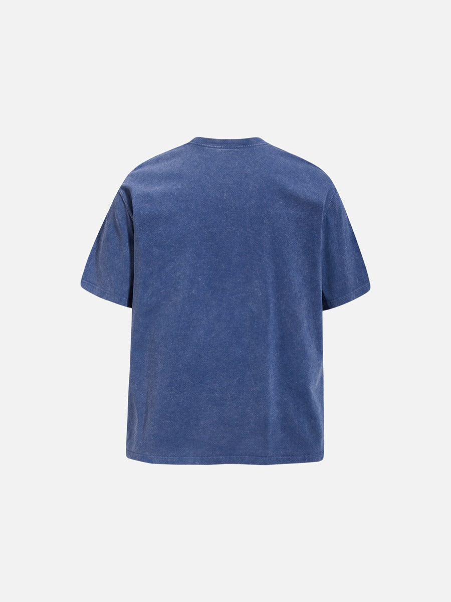Full-length styling view of oversized graphic T-shirt with faded pixel print