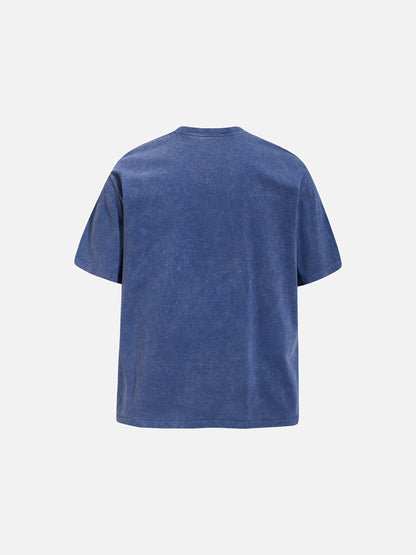 Full-length styling view of oversized graphic T-shirt with faded pixel print