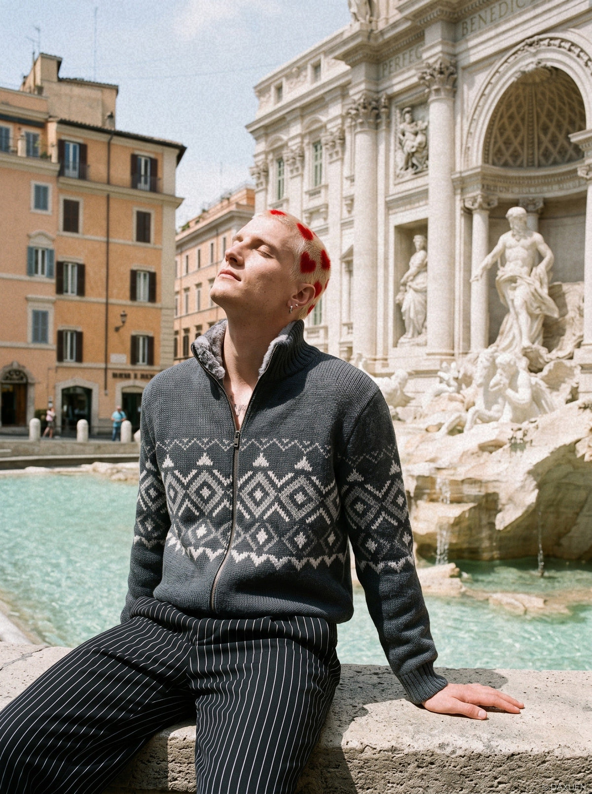 Close-up of the textured geometric knit pattern on the cardigan