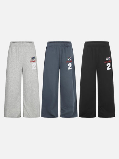 Wide-leg graphic sweatpants with elastic waistband detail