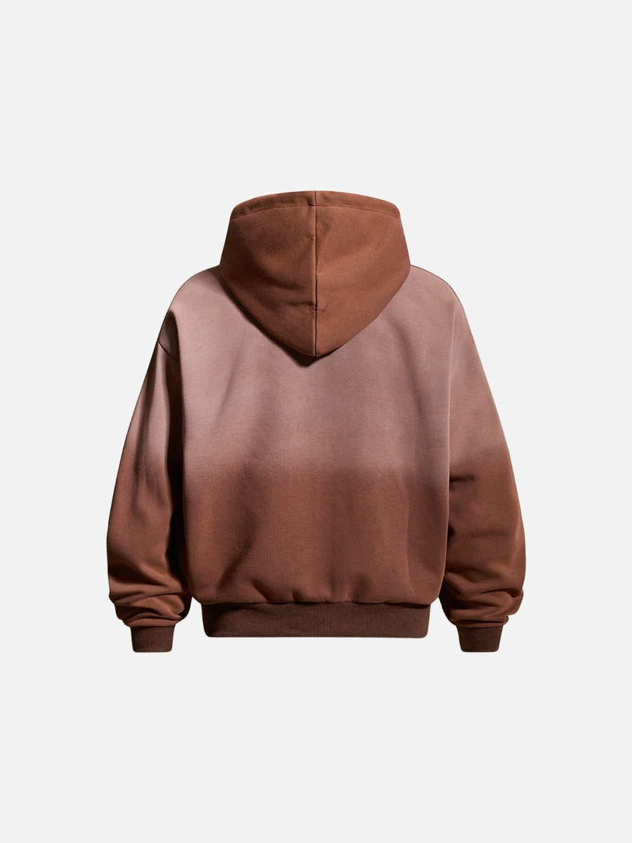 Sleeve detail on a gradient graphic hooded jacket