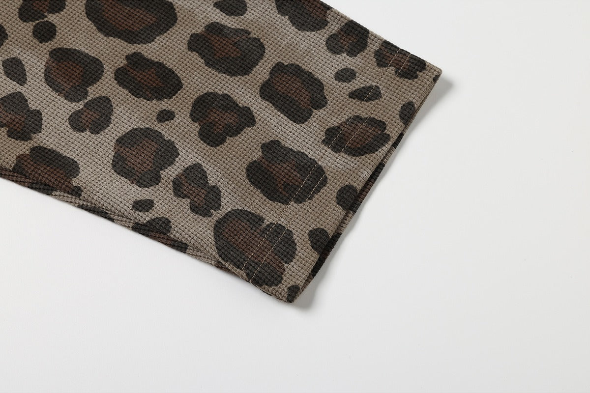 Leopard print cross graphic tee shown with its relaxed casual styling