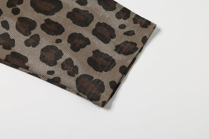 Leopard print cross graphic tee shown with its relaxed casual styling