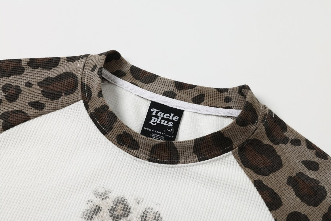 Casual long-sleeve T-shirt with leopard print and a faith-inspired cross graphic
