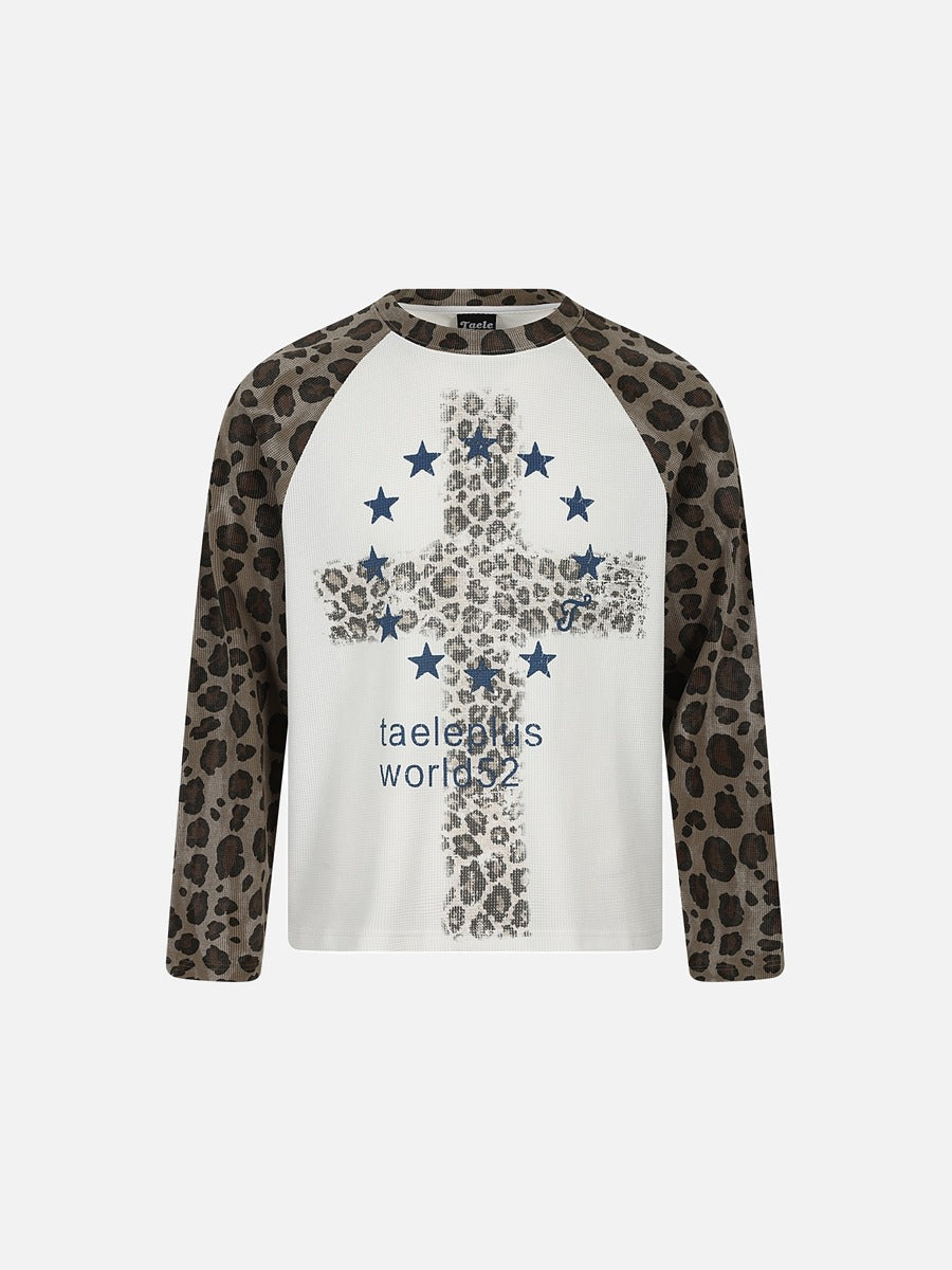 Leopard print long-sleeve T-shirt with a bold cross graphic on the front