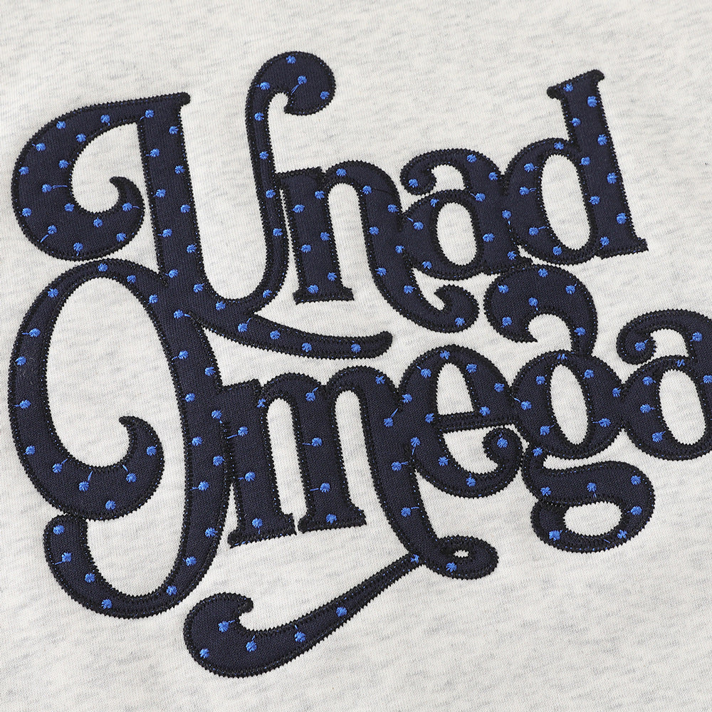 Detail of the hood on a polka dot raglan sweatshirt