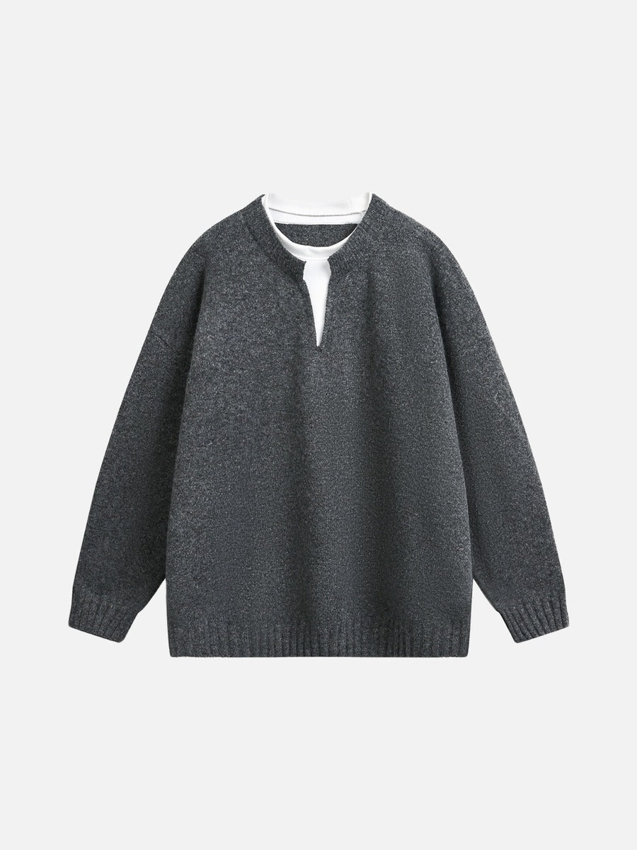 Soft light grey knitted jumper with long sleeves