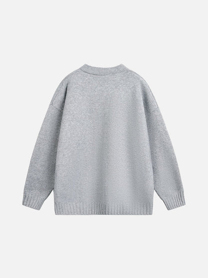 Oversized light grey jumper styled for a casual outfit