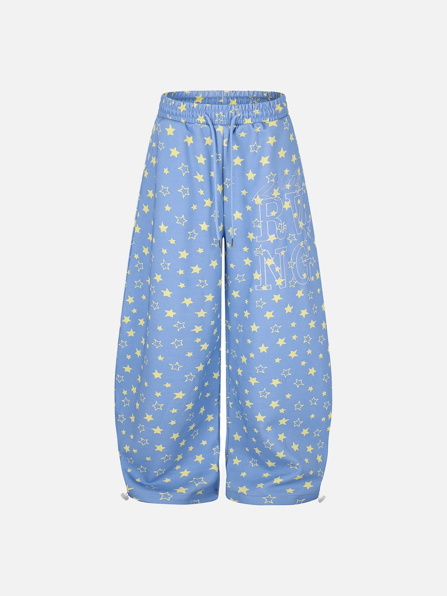 Rear view of wide-leg star print trousers with star pattern